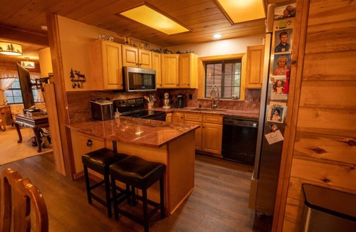 Crystal Lake Cabin | Warm Woodland Getaway with Land