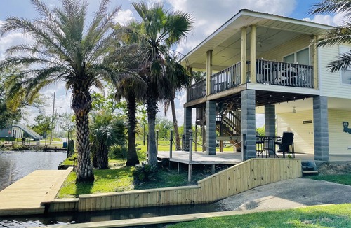Shoreline Park House | Waterfront Camp in Jourdan River Estates