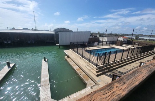 Port O Connor Villa | Waterfront Condo with Private Boat Slip and Community Swimming Pool