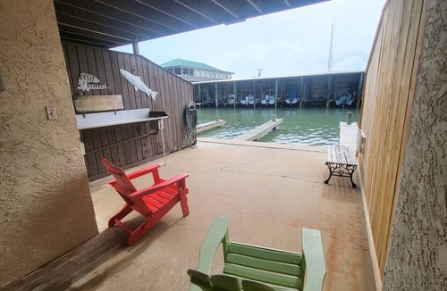 Port O Connor Villa | Waterfront Condo with Private Boat Slip and Community Swimming Pool