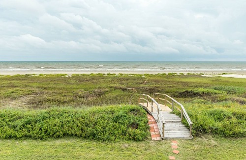 Miramar House | Waterfront home w/ wraparound deck, patio, & private beach access - two dogs OK