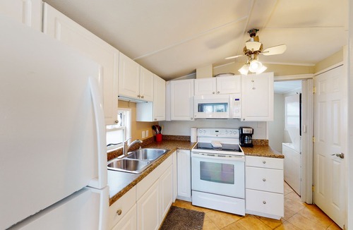 Port Isabel House | Waterfront Park Model Home w/boat slip & shared pools, hot tub,tennis, gym