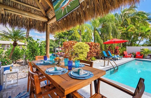 Golfview Harbor House | Waterfront w/Htd Pool, Tiki Hut, Billards, & Bar