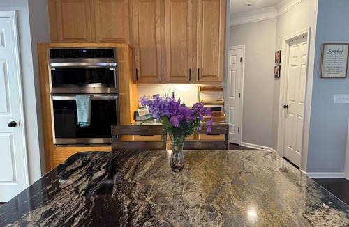 Greensboro House | Welcome to The Clover, a spacious 2-story vacation home that blends charm with modern comfort. Perfect for families, friends, or groups, this cozy retreat features inviting living spaces, a fully equipped modern kitchen & comfortable bedrooms.