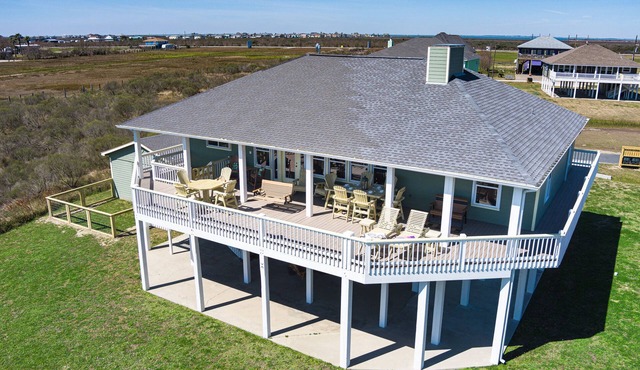 4-bedroom family home walking distance to the beach. 27 miles of golf cart fun.