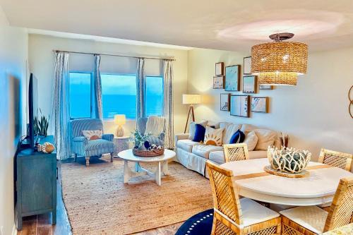 Beachfront condo with furnished balcony, amazing pool, tennis, & mini-golf
