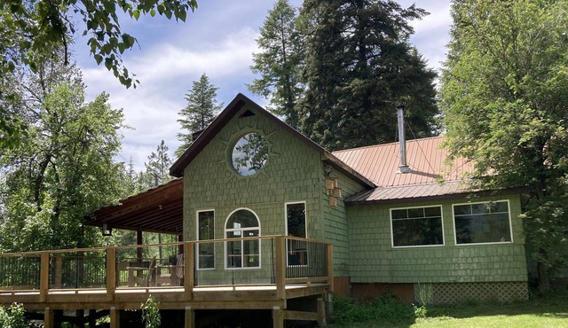 Beautiful Riverfront Home on Acreage
