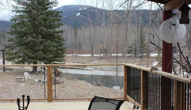 Beautiful Riverfront Home on Acreage
