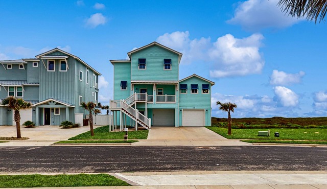 Bright and spacious home steps from the sand w/Shared Pool & Private Balcony