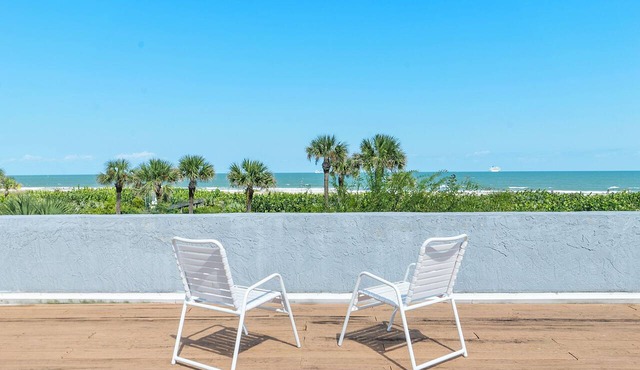 Coastal living meets luxury in this 3-bed, 2-bath oasis in an oceanfront complex