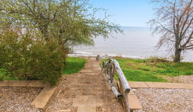 Deck + Fire Pit: Waterfront Lake Michigan Escape in Algoma