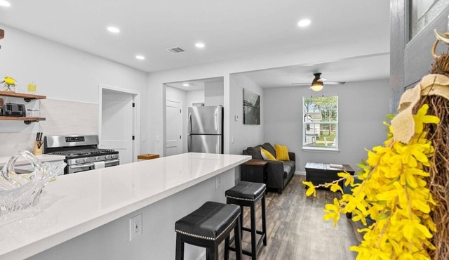 Fully renovated historic train depot bungalow in old town League City! Bright, stylish 1BR/1BA home.