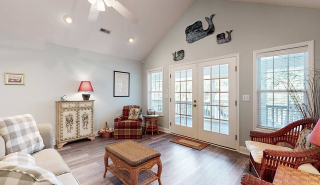 Peaceful home close to the beach with EV Charger, screened-in porch, large yard