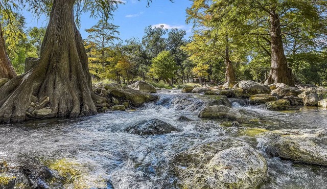 Premier river-front Penthouse Condo on the Guadalupe Rapids in Gruene!