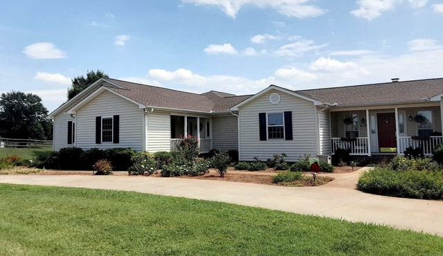 Quiet, country setting with large yard, pool and NO cleaning fee.