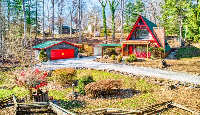 Recently updated rustic A-frame with hot tub, dazzling outdoor views, & firepit