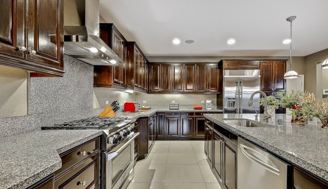Resort-style home + guesthouse with private pool, hot tub, bar, & mountain views