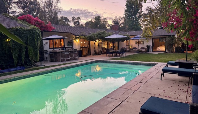 Resort style single level contemporary home with pool