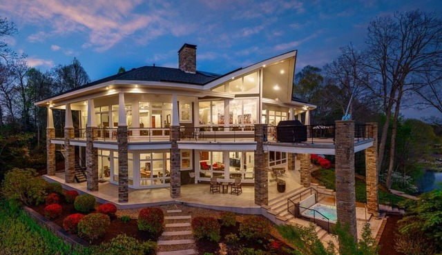 Sleeps 22 on Lake Norman, Island Retreat with Private Dock, Hot Tub, Game Rooms, Elevator, Full Bar, 2+ Acres of Lakefront Paradise, Fire Pit, Covered Dock, Kayaks, Perfect for Reunions, Corporate Retreats and Large Group Getaways