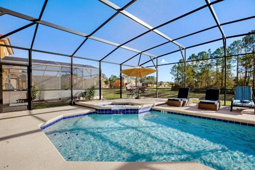 Spacious 6-Bedroom Getaway with Game Room, Private Spa & Sunny Pool Deck in Premier Resort Setting
