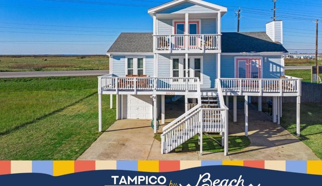 Stunning beach house with ocean views and large deck, just steps from the beach