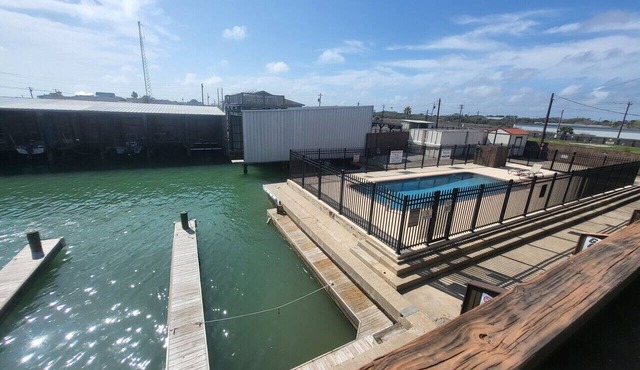 Waterfront Condo with Private Boat Slip and Community Swimming Pool