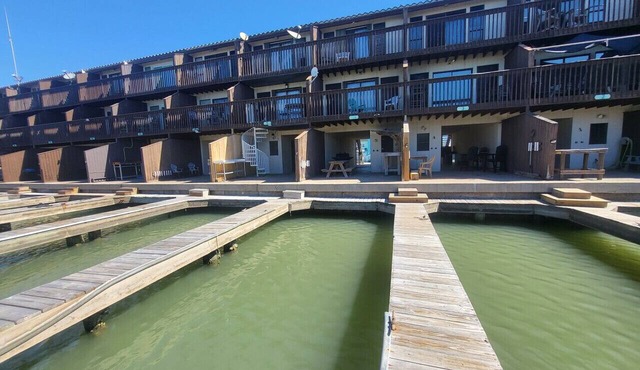 Waterfront Condo with Private Boat Slip and Community Swimming Pool