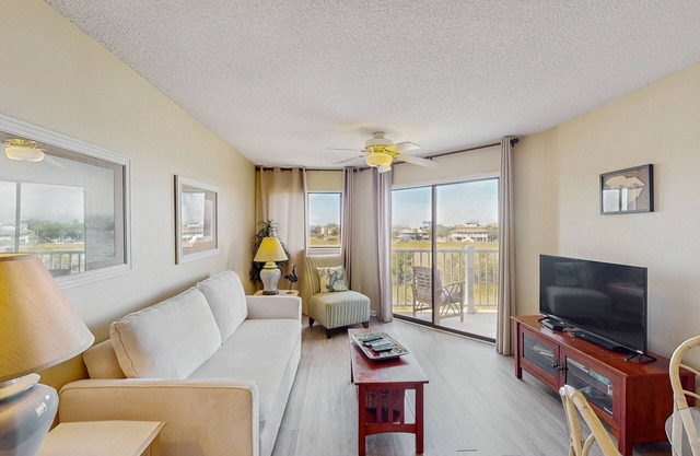 Second-Floor Condo w/Private Covered Balcony, Views, Free WiFi, and Shared Pool