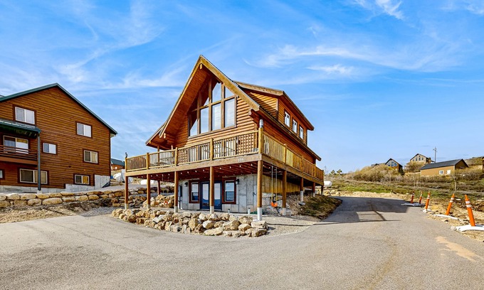 Harbor Village Cabin | Beautiful log cabin with lake views, wraparound deck, & foosball