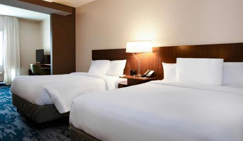 Queen Suite with Two Queen Beds and Sofa Bed