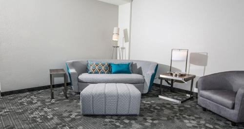Queen Suite with Two Queen Beds and Sofa Bed
